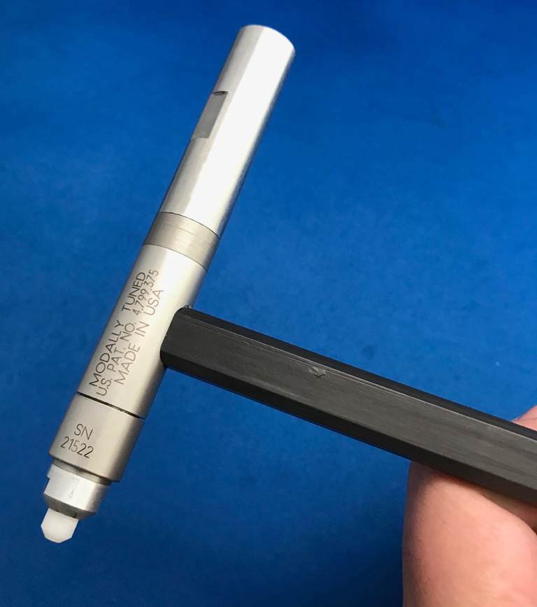 A hand holding a tool

AI-generated content may be incorrect.
