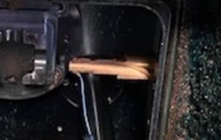 A piece of wood in a machine

AI-generated content may be incorrect.