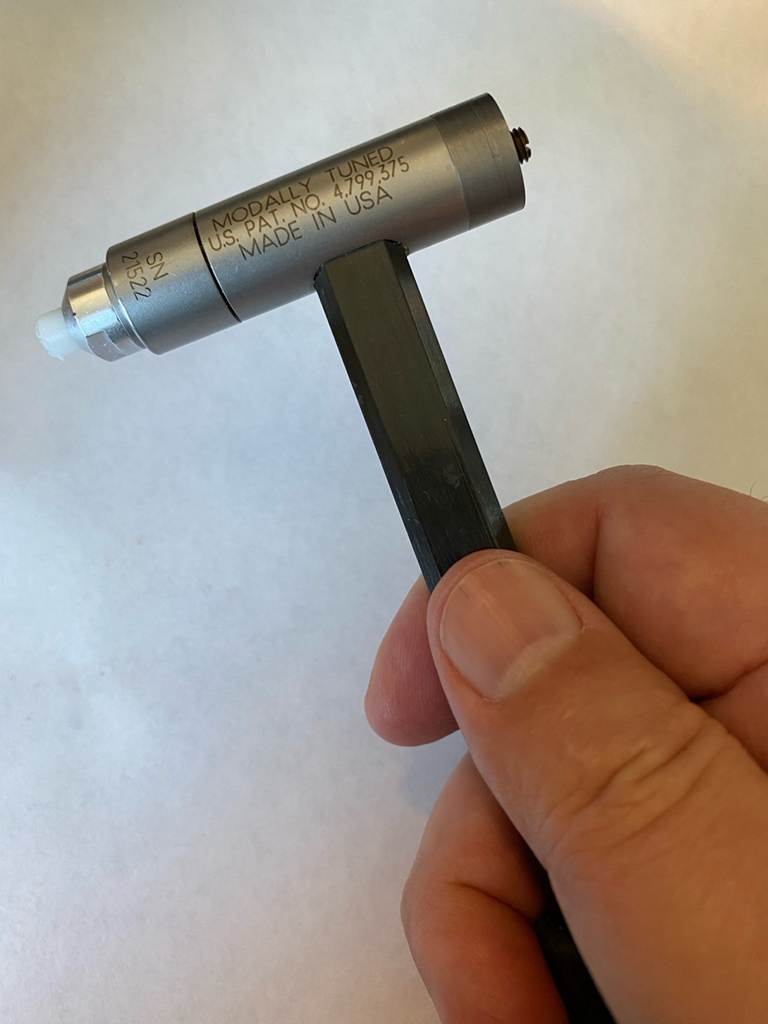 A hand holding a tool

AI-generated content may be incorrect.